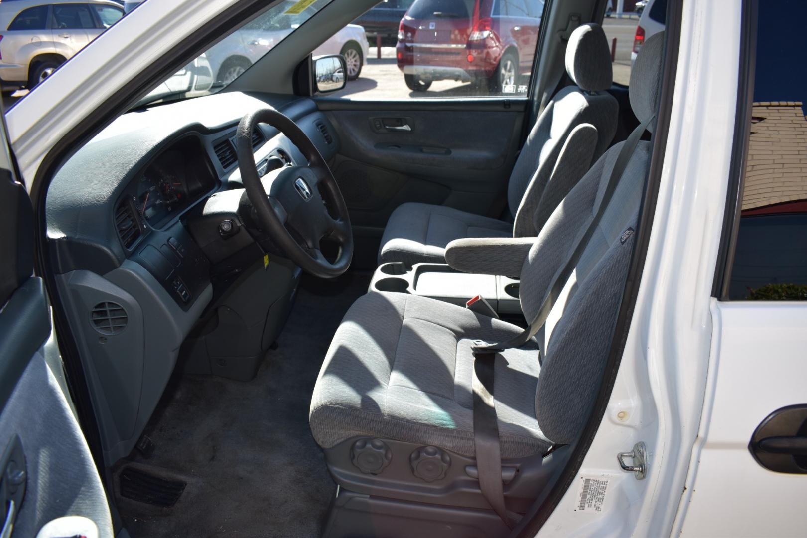 2003 White /Gray Honda Odyssey (5FNRL18513B) , located at 5925 E. BELKNAP ST., HALTOM CITY, TX, 76117, (817) 834-4222, 32.803799, -97.259003 - Buying a 2003 Honda Odyssey can be a smart choice for several reasons: Reliability: Hondas are known for their reliability, and the Odyssey is no exception. The 2003 model year is often praised for its durability and long-lasting performance. Safety: The 2003 Honda Odyssey comes equipped with safe - Photo#8